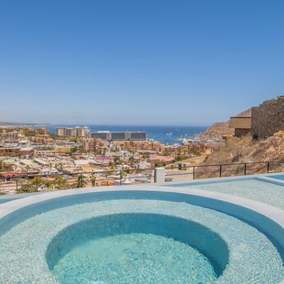 Jacuzzi overlooking the city and ocean