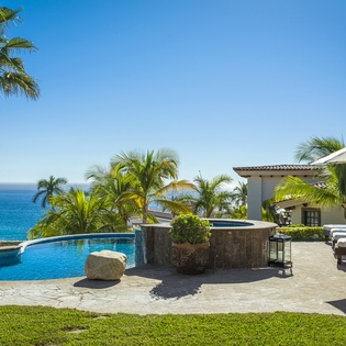 Gorgeous poolside patio with ocean views