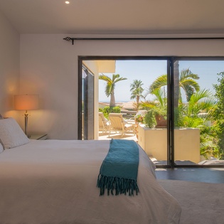 Bedroom suite with patio access