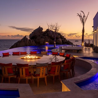 Patio with firepit and ocean view