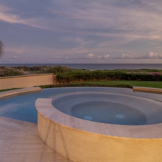 Pool and jacuzzi with ocean view