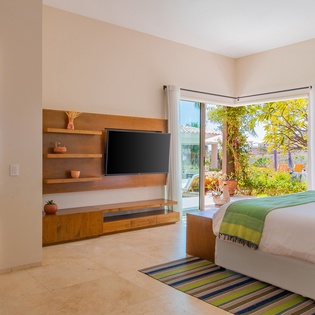 Bedroom suite with patio access