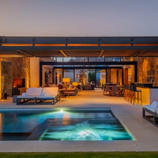Exterior and pool at sunset