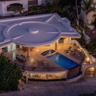 Bird's eye view of villa at sunset