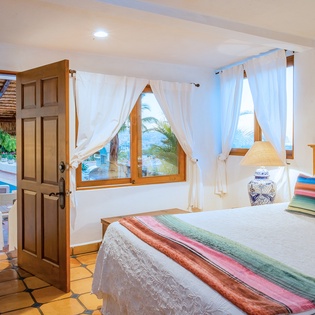 Bedroom suite with patio access
