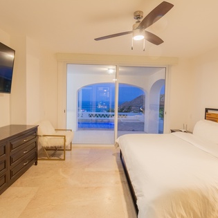 Bedroom suite with patio access