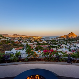Patio with fire pit and ocean views