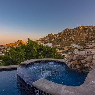 Pool and jacuzzi overlooking ocean views