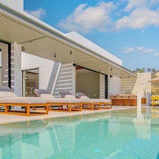 Slip into paradise at your private pool terrace, where sleek loungers and crystal-clear waters await your perfect day of relaxation.