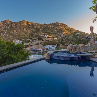Pool and jacuzzi overlooking ocean views