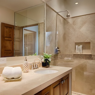 En suite bathroom with walk in shower