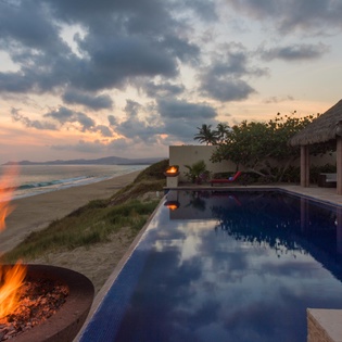 Pool with ocean view and fire pit -12