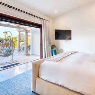 Bedroom suite with patio access