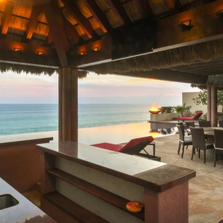 Patio with BBQ grill and lounge furniture