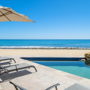 Incredible beachfront patio with pool and jacuzzi