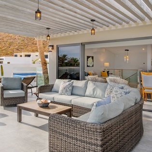 Your private oasis awaits with plush outdoor seating where you can unwind with poolside views and seamless indoor-outdoor flow.