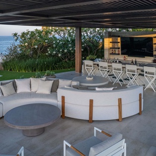 Patio with outdoor seating and bar
