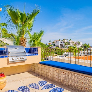 Sunny patio with BBQ grill