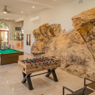 Entertainment area with foosball and a pool table