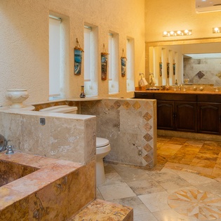 En suite bathroom with bath tub