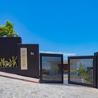 Gated exterior of villa