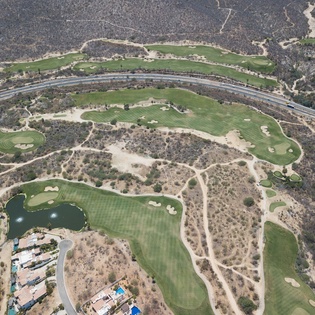 Aerial view of neighborhood featuring ack Nicklaus’ signature golf course