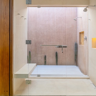 En-suite bathroom with walk-in bathroom