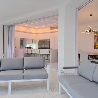 Open living area extends to the outdoor terrace