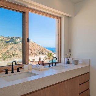 En suite bathroom with ocean views