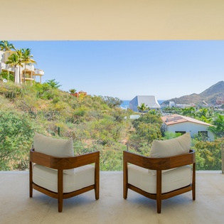 Settle into your private terrace chairs and soak in breathtaking views of rolling hills and distant mountains.