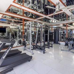 Stay active in this fully-equipped fitness center with modern cardio machines, weight training equipment, and panoramic windows to keep you motivated.