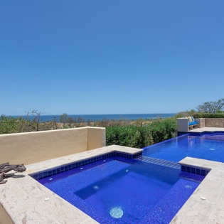 Jacuzzi and infinity pool with ocean views
