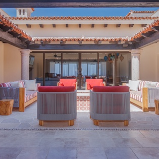 Villa exterior with fire pit and outdoor seating