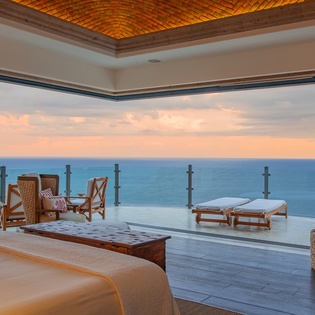 Bedroom suite with private terrace and ocean views