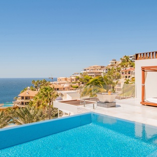 Patio with outdoor bed and ocean view