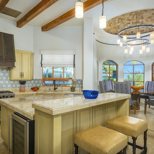 Your spacious kitchen features a stunning island, top-tier appliances, and elegant dining nook where memorable meals come together.