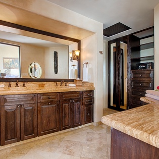 Step into your spacious bathroom sanctuary with dual vanities, luxe countertops, and artisan touches. Everything you need to unwind awaits.