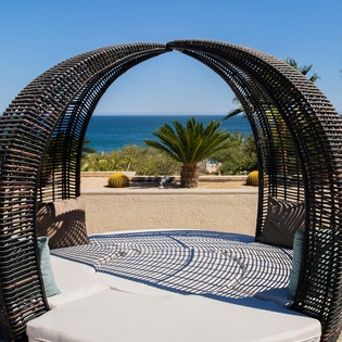 Sunny lounge daybed with ocean views