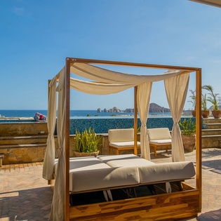 Canopy bed with an ocean view