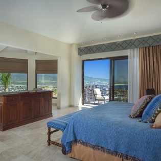 Bedroom suite with ocean views and access to terrace