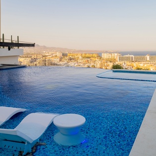 Relax with the lounge chairs in the pool