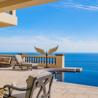 Poolside patio with ocean views