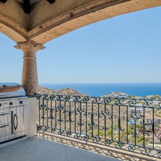 Fire up your private grill while taking in breathtaking ocean views from this stunning covered terrace.