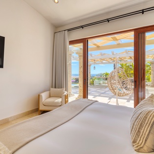 Bedroom suite with patio access