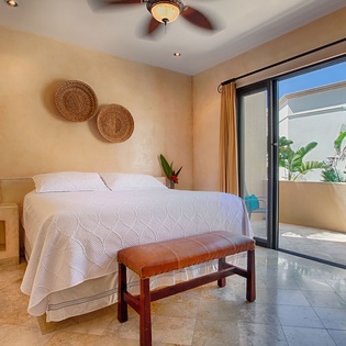 Wake up in this serene bedroom where natural light and tropical breezes greet you each morning. Your private terrace opens to lush greenery, perfect for sipping coffee in peaceful seclusion.