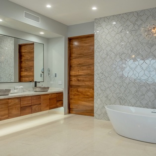 En-suite bathroom with bathtub