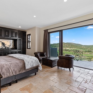 Bedroom suite with views and terrace access
