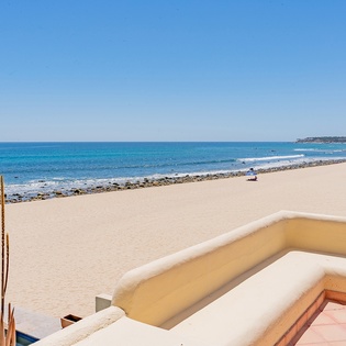 Outdoor seating with beachfront views