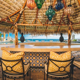 Bar seating under the palapa