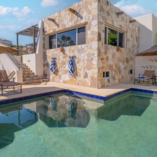Lounge by the sunny poolside